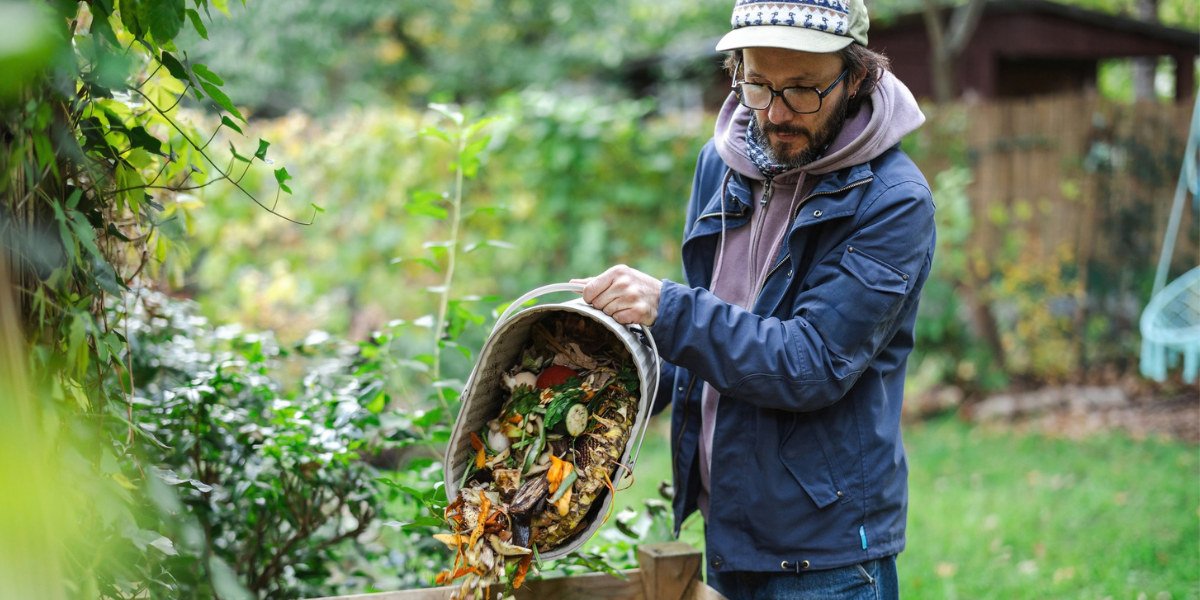 Man at compost heap